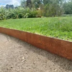 Corten Landscape Edge along a paved garden pathway