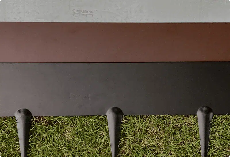 Steel garden edging with integrated spikes for secure installation